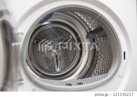 Inside of tumble dryer - new generation of dryer, household concept Inside of tumble dryer - new generation of dryer, household concept 121150217