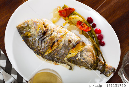 Dorado baked in oven 121151720