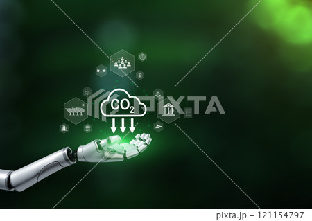 Carbon icon on robot hand for Green energy concept, Reduction of carbon emissions, carbon neutral concept. Carbon reduction sign on hand. Net zero greenhouse gas emissions target in 2050. Carbon icon on robot hand for Green energy concept, Reduction of carbon emissions, carbon neutral concept. Carbon reduction sign on hand. Net zero greenhouse gas emissions target in 2050. 121154797