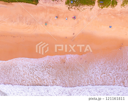 Amazing Top view colorful pink sand beach landscape background,Summer sea waves crashing on sandy shore seascape background,High angle view ocean nature beach background Amazing Top view colorful pink sand beach landscape background,Summer sea waves crashing on sandy shore seascape background,High angle view ocean nature beach background 121161811