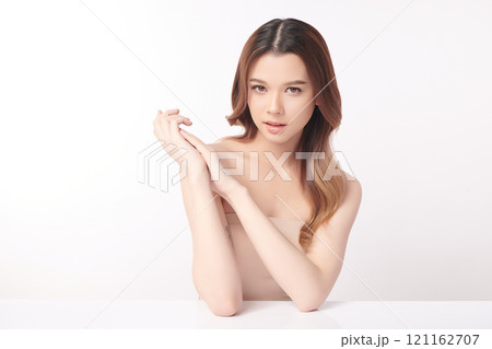 Beautiful young asian woman with clean fresh skin on white background, Face care, Facial treatment, Cosmetology, beauty and spa, Asian women portrait. Beautiful young asian woman with clean fresh skin on white background, Face care, Facial treatment, Cosmetology, beauty and spa, Asian women portrait. 121162707