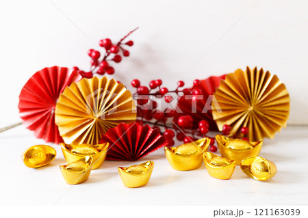 Chinese New Year festival decorations with red Chinese folded fans. 121163039