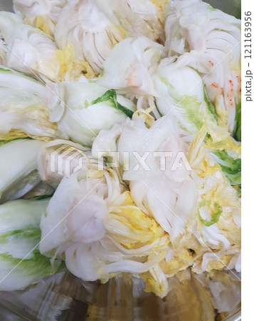woman hand washing cabbage with cabbage 121163956