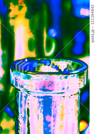 The neck of a vintage glass bottle, modified color scheme, colorful background in pastel colors.  121164842