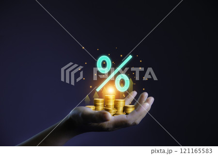 stacking coin money at hand. Save stacking coin money for growing your business investment concept. gold coins is representing riches and wealth, financial investment business stock growth. 121165583