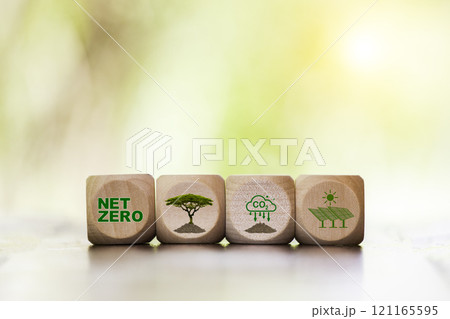 Net zero icon at wood box on wonder floor at concrete wall background. net zero for environmental, social, sustainable and ethical. Net zero emission Idea innovative carbon neutrality in 2050. 121165595