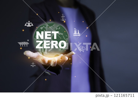 Net zero icon, carbon neutral and ESG concept. net zero greenhouse gas emissions target Climate neutral. Human hand holding eco green energy system icon around background. 121165711