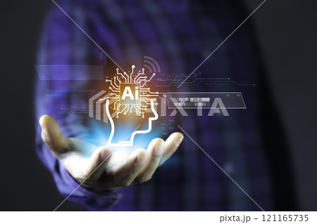 Business hand holding touching AI icon networks. With artificial intelligence (AI)and information exchange, AI machine learning language. Cyber security system using AI technology. Business hand holding touching AI icon networks. With artificial intelligence (AI)and information exchange, AI machine learning language. Cyber security system using AI technology. 121165735