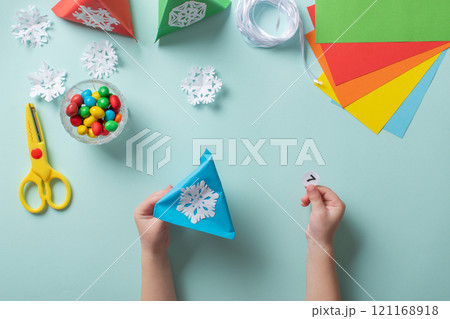 Advent calendar made of colored paper. Step-by-step instructions for making Christmas crafts. Diy for children. flat lay Advent calendar made of colored paper. Step-by-step instructions for making Christmas crafts. Diy for children. flat lay 121168918