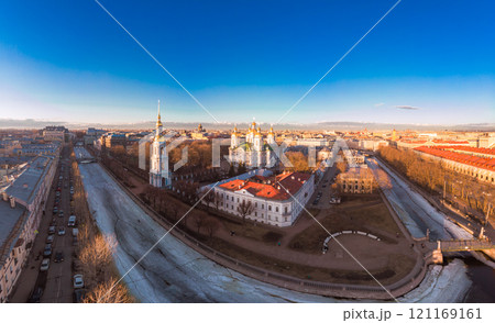 Aerial top view to St. Nicholas Naval Sea Cathedral. Panorama of evening historical city center - Semimostye. Orthodox church located on banks of Kryukov and Griboyedov canal. Saint Petersburg. Russia 121169161