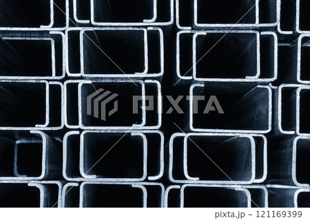 Close up scene the square steel pipe profile in the light blue scene. Close up scene the square steel pipe profile in the light blue scene. 121169399