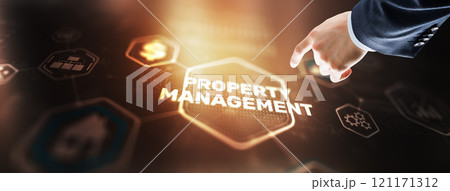 Businessman pressing PROPERTY MANAGEMENT button on virtual screens 121171312