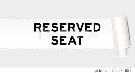 Ripped gray paper background that have word reserved seat  under torn part 121171689