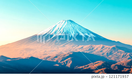 Majestic mount fuji dominating the landscape with its snow capped peak under a clear blue sky 121171937