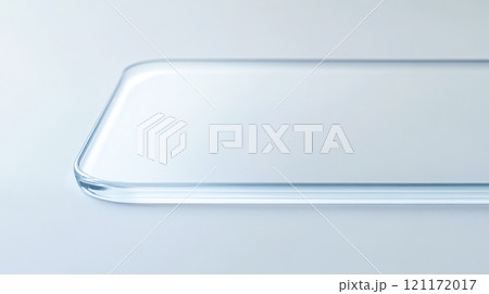 Thin acrylic sheet with rounded corners resting on white surface 121172017