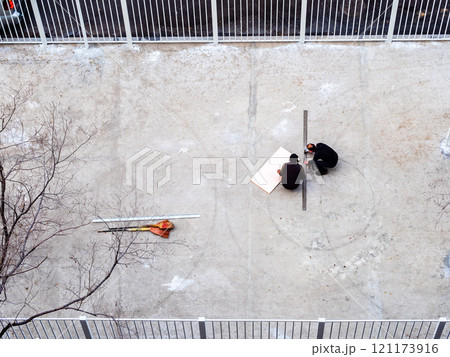 top view of repair and marking of sports ground 121173916