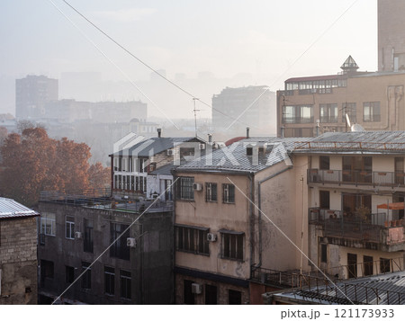 view of apartment buildings in smog in Yerevan view of apartment buildings in smog in Yerevan 121173933