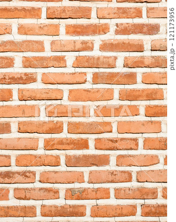 outdoor orange brick wall with seams on sunny day outdoor orange brick wall with seams on sunny day 121173956