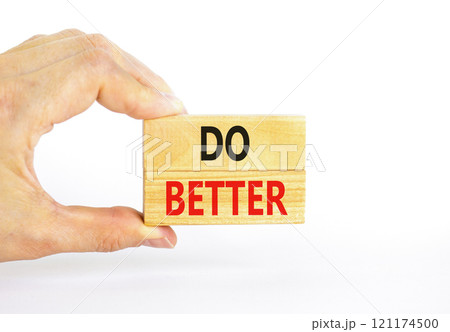 Do better symbol. Concept words Do better on beautiful wooden blocks. Beautiful white background. Businessman hand. Business and do better concept. Copy space. Do better symbol. Concept words Do better on beautiful wooden blocks. Beautiful white background. Businessman hand. Business and do better concept. Copy space. 121174500