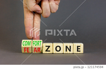 Comfort or fear zone symbol. Concept words Comfort zone Fear zone on wooden cubes. Beautiful grey table grey background. Psychologist hand. Business and comfort or fear zone concept. Copy space. Comfort or fear zone symbol. Concept words Comfort zone Fear zone on wooden cubes. Beautiful grey table grey background. Psychologist hand. Business and comfort or fear zone concept. Copy space. 121174594