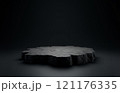 Display platform made of black stone on a black background. Mockup for advertising. 121176335