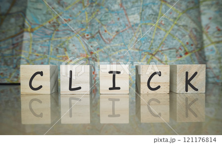 Click is written in black letters on a wooden block Click is written in black letters on a wooden block 121176814