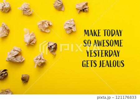 Yellow background with a bunch of crumpled paper on it Yellow background with a bunch of crumpled paper on it 121176833