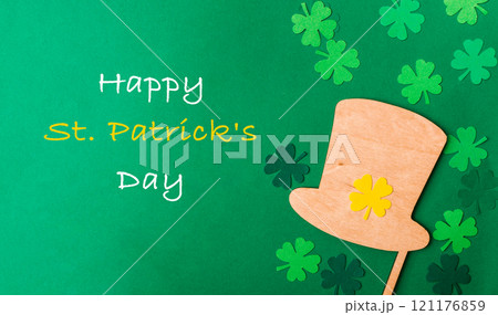 Green background with a hat and shamrock on it Green background with a hat and shamrock on it 121176859