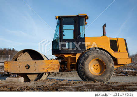 Road Roller Compactor at Construction Site 121177518