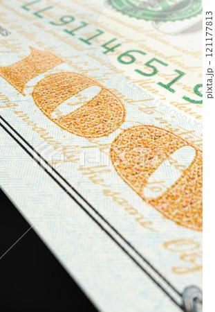 One Hundred Dollar Bills Close-up Abstract. 121177813