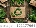 A plantthemed recycling symbol surrounded by lush green leaves 121177964