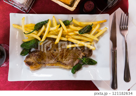 Top view of beef steak with side dish 121182634