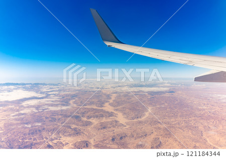 Aerial view on arabian desert and Red sea mountains from airplane Aerial view on arabian desert and Red sea mountains from airplane 121184344