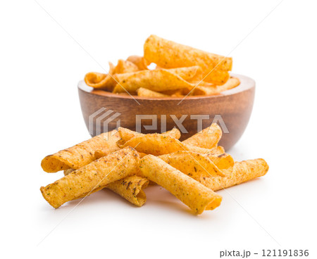 Rolled nachos tortilla chips isolated on white background. Rolled nachos tortilla chips isolated on white background. 121191836