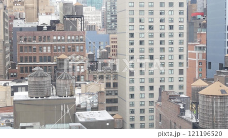 New York City Manhattan cityscape. Rooftop water towers, residential district buildings roof tanks. 121196520