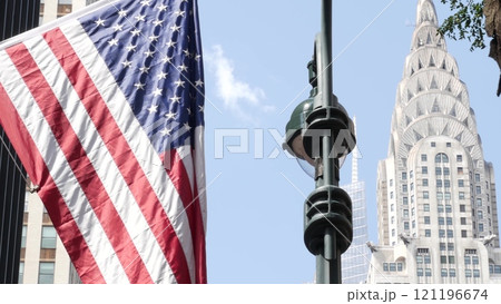 New York, american flag waving. Chrysler building. Manhattan midtown city street banner, patriotism. 121196674