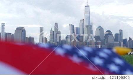 New York City waterfront skyline, Manhattan Downtown World Trade Center cityscape. American USA flag 121196806