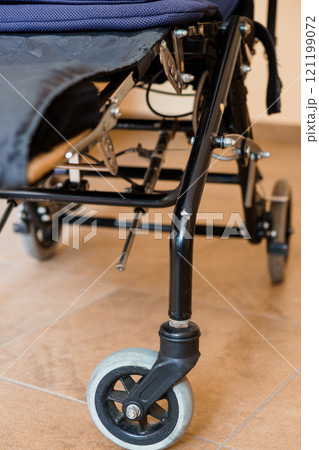 Close-up of Wheelchair Frame with Detailed Mechanisms 121199072