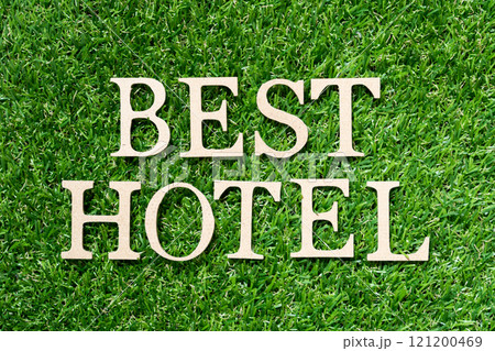 Wood alphabet letter in word best hotel on artificial green grass background Wood alphabet letter in word best hotel on artificial green grass background 121200469