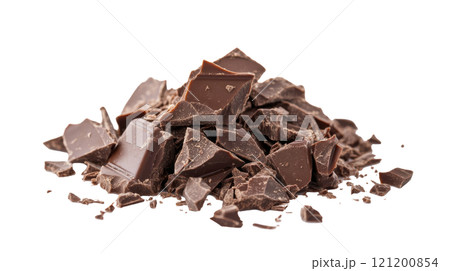Delicious chunks of dark chocolate scattered on a clean white background ready for baking treats 121200854