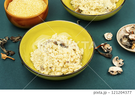 Pearl millet with fried mushrooms. Pearl millet with fried mushrooms. 121204377
