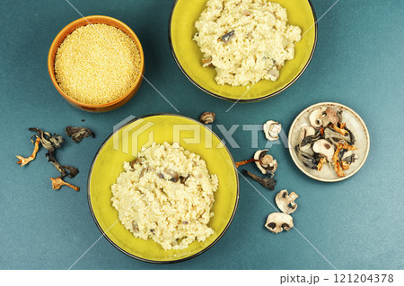 Pearl millet with fried mushrooms. 121204378