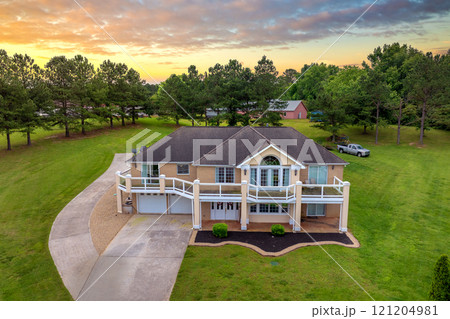 Wealthy residential area in USA suburbs. Rich neighborhood with expensive suburban homes in Kingston, Tennessee Wealthy residential area in USA suburbs. Rich neighborhood with expensive suburban homes in Kingston, Tennessee 121204981