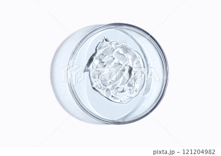 Skin serum or face wash gel in a Petri dish. For cosmetic procedures. 121204982