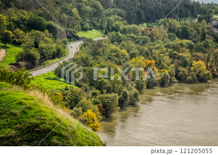 The fortress perched on Petrovaradin Hill watches over the city, while the charming streets and modern buildings of Novi Sad are spread out, creating a perfect blend of history and contemporary life 121205055