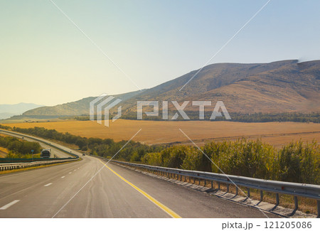 road in the morning, road with Mountain, Kazakhstan road and nature. High quality photo 121205086