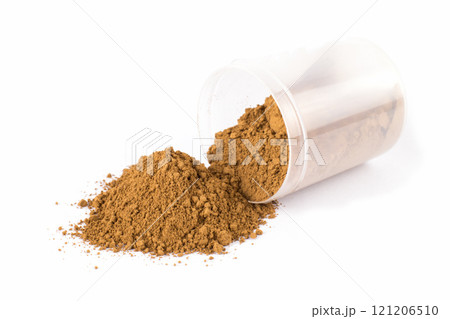 Turmeric Powder on a White Surface With a Utensil for Scooping Turmeric Powder on a White Surface With a Utensil for Scooping 121206510