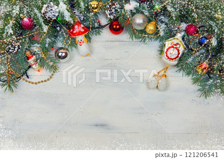 Christmas wooden background with snow branch. Top view with copy space for your text Christmas wooden background with snow branch. Top view with copy space for your text 121206541