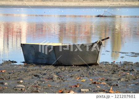 Abandoned boat on the lake. 121207681
