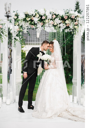 Close up of a nice young wedding couple 121207861